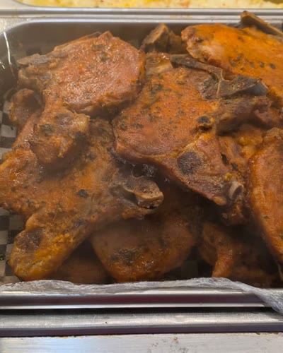 Tray of seasoned pork chops