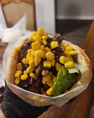 Brazilian burger with steak, sweet corn and lettuce
